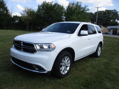 2015 Dodge Durango for sale at Triangle Auto Sales in Elgin IL