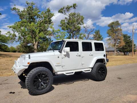 2015 Jeep Wrangler Unlimited for sale at TNT Auto in Coldwater KS