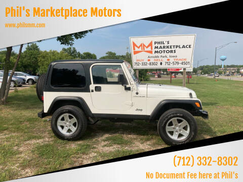 1997 Jeep Wrangler for sale at Phil's Marketplace Motors in Arnolds Park IA