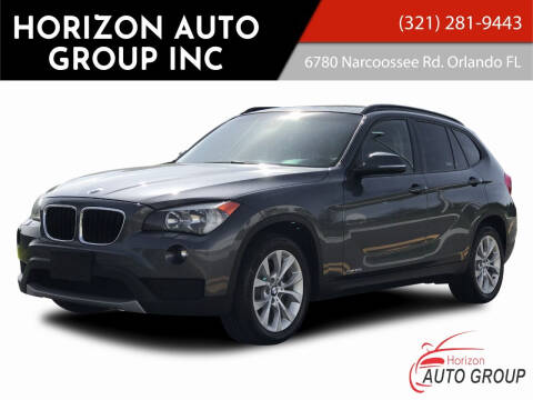 2014 BMW X1 for sale at HORIZON AUTO GROUP INC in Orlando FL