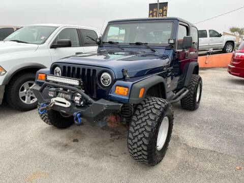 2000 Jeep Wrangler for sale at MILLENIUM MOTOR SALES, INC. in Rosenberg TX