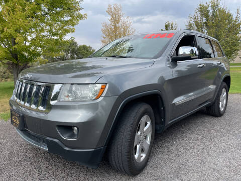 2012 Jeep Grand Cherokee for sale at BELOW BOOK AUTO SALES in Idaho Falls ID