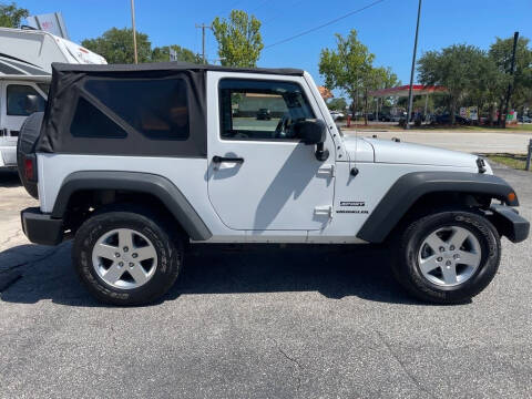 2012 Jeep Wrangler for sale at Blum's Auto Mart in Port Orange FL