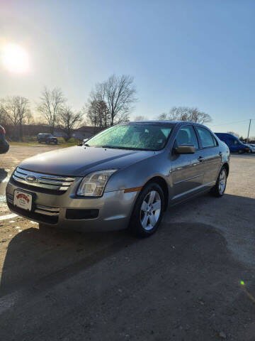 2009 Ford Fusion for sale at WESTSIDE GARAGE LLC in Keokuk IA