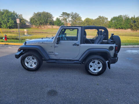 2014 Jeep Wrangler for sale at Carcoin Auto Sales in Orlando FL