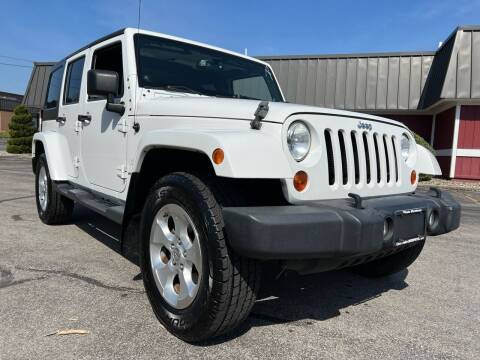 2013 Jeep Wrangler Unlimited for sale at Auto Warehouse in Poughkeepsie NY