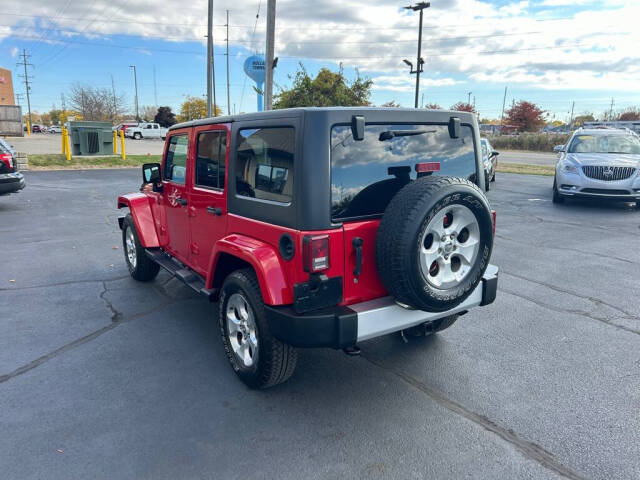 2014 Jeep Wrangler Unlimited for sale at Wyrick Auto Sales & Leasing Inc in Holland, MI