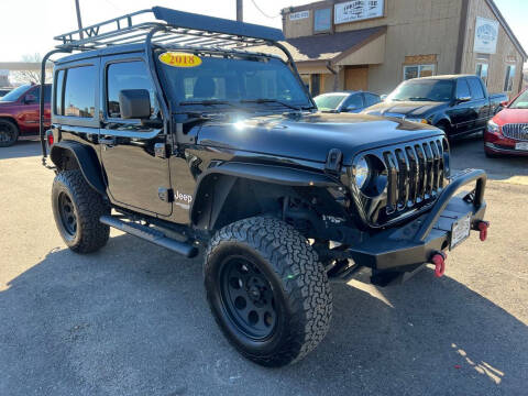 2018 Jeep Wrangler for sale at BERKENKOTTER MOTORS in Brighton CO