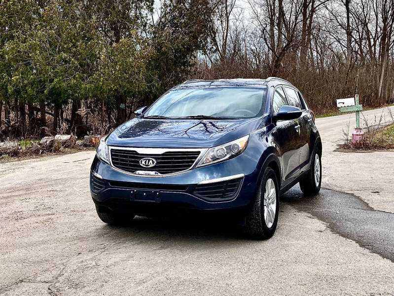 2013 Kia Sportage for sale at Pricebuster Auto in Utica NY