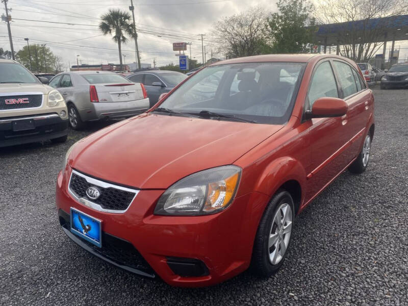 2010 Kia Rio5 for sale at Lamar Auto Sales in North Charleston SC