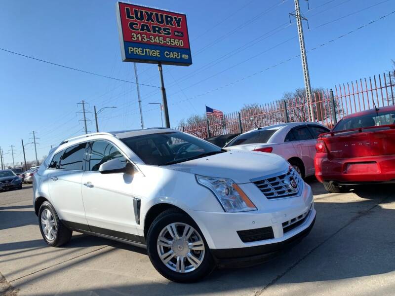 2014 Cadillac SRX for sale at Dymix Used Autos & Luxury Cars Inc in Detroit MI