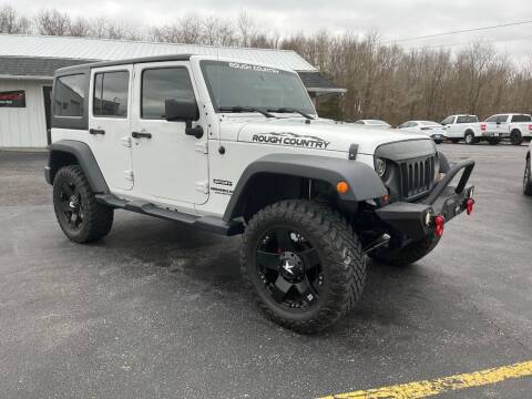 2013 Jeep Wrangler Unlimited for sale at JANSEN'S AUTO SALES MIDWEST TOPPERS & ACCESSORIES in Effingham IL
