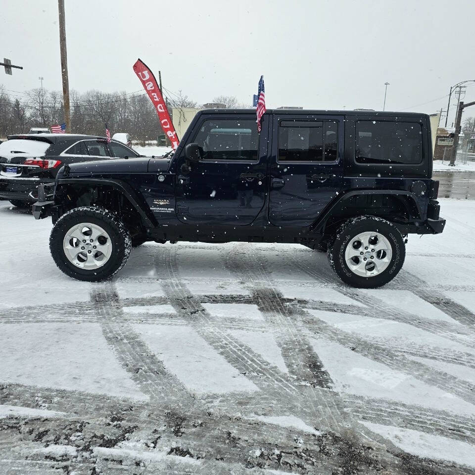 2013 Jeep Wrangler Unlimited for sale at Norman's Auto Sales in Cleveland, OH