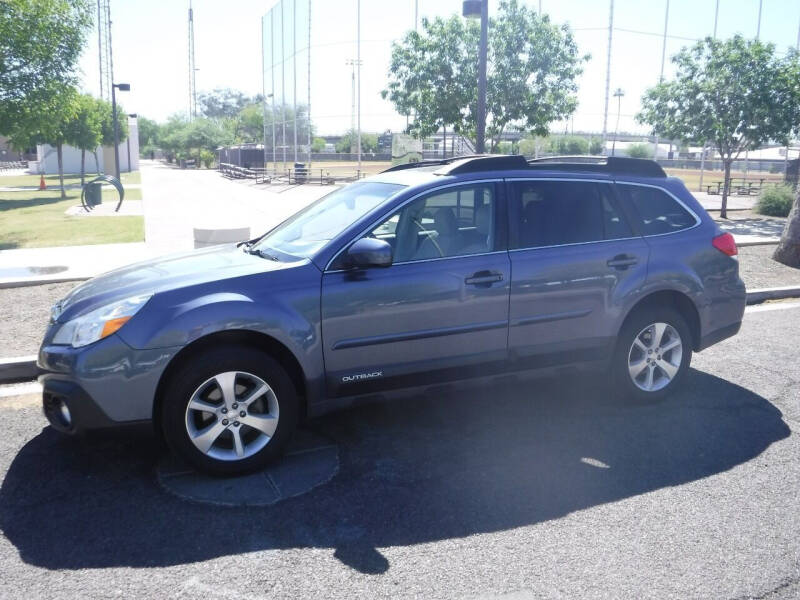 2013 Subaru Outback for sale at J & E Auto Sales in Phoenix AZ