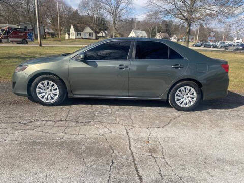 2014 Toyota Camry for sale at Bowlings Used Cars in Canton OH
