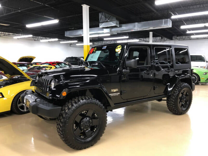 2014 Jeep Wrangler Unlimited for sale at Fox Valley Motorworks in Lake In The Hills IL