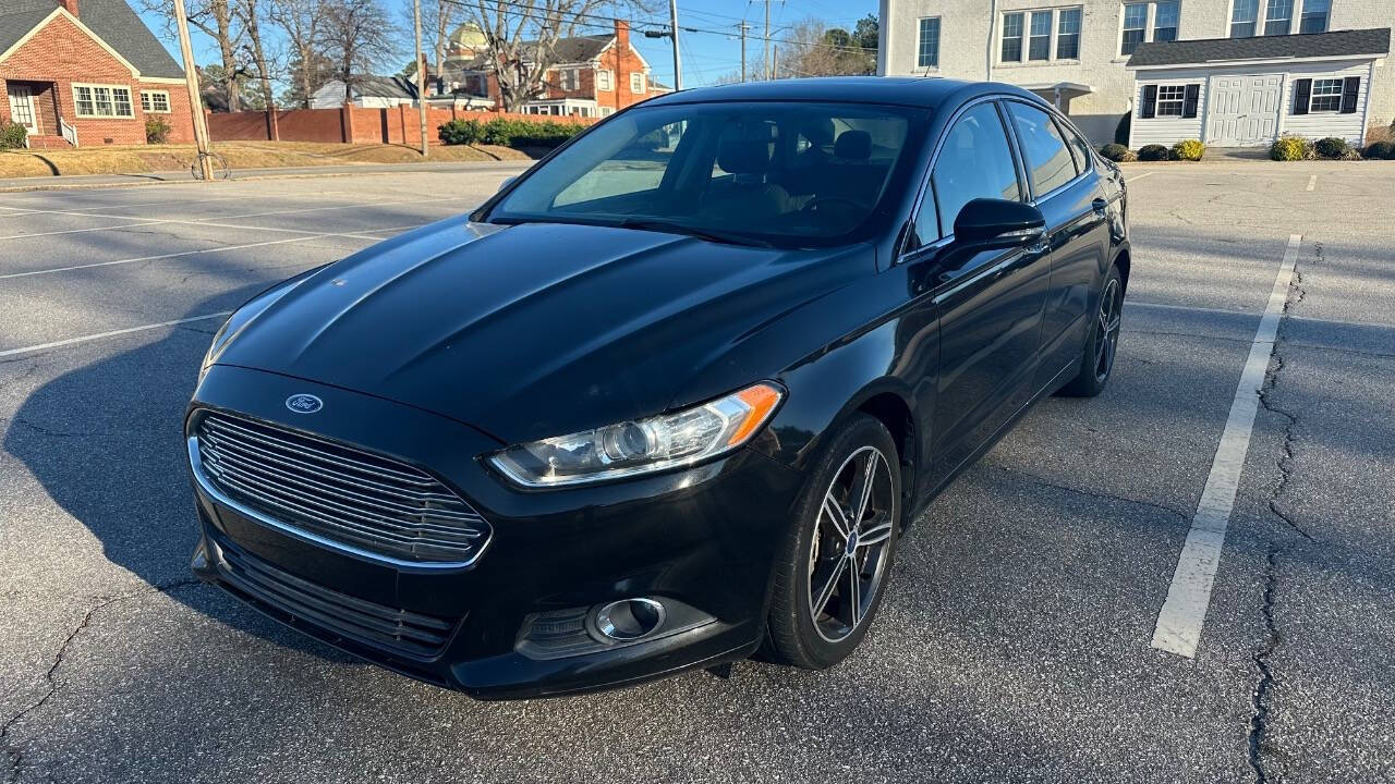 2014 Ford Fusion for sale at Caropedia in Dunn, NC