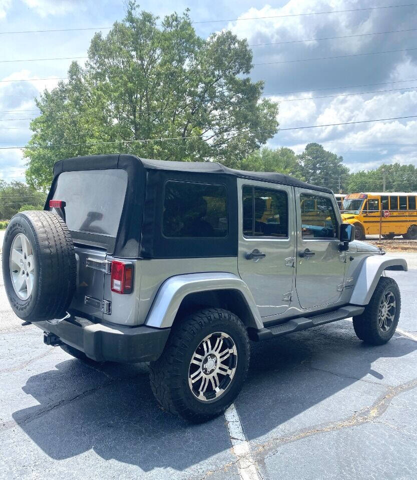 2013 Jeep Wrangler Unlimited for sale at International Car Service, Inc in DULUTH, GA