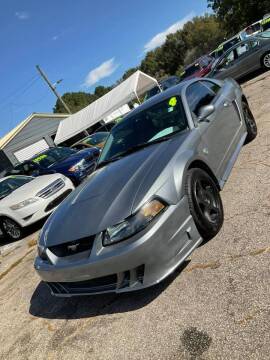 2004 Ford Mustang for sale at Autocom, LLC in Clayton NC