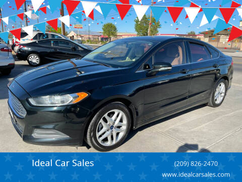 2014 Ford Fusion for sale at Ideal Car Sales in Los Banos CA