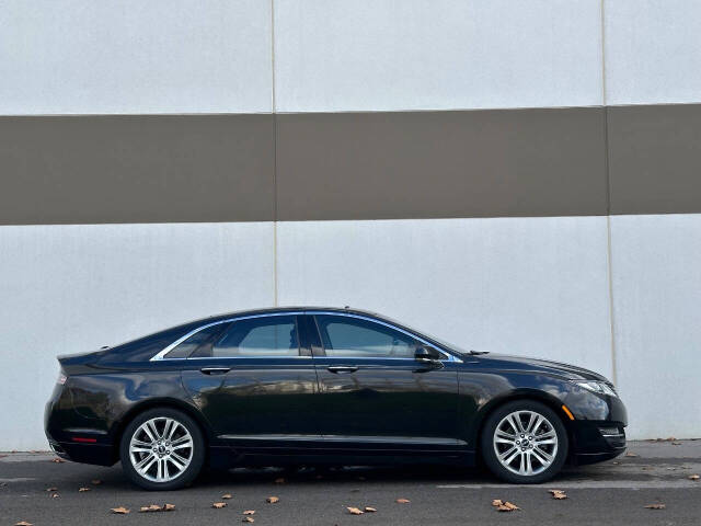 2015 Lincoln MKZ for sale at Phoenix Motor Co in Romulus, MI