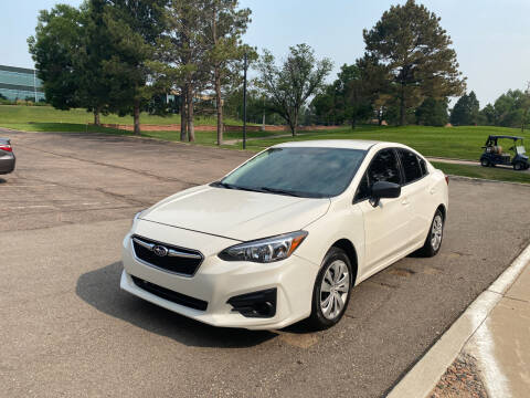 2017 Subaru Impreza for sale at QUEST MOTORS in Englewood CO