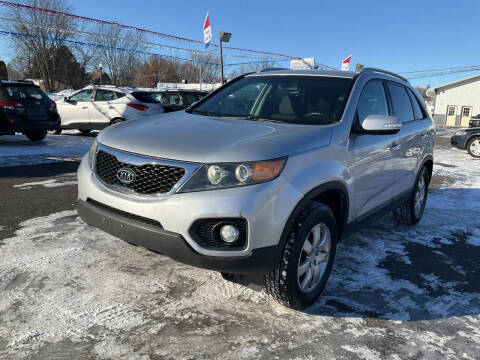 2011 Kia Sorento for sale at Steves Auto Sales in Cambridge MN