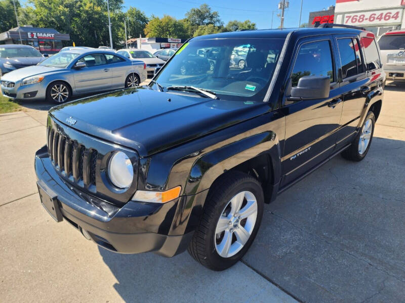 2014 Jeep Patriot for sale at Quallys Auto Sales in Olathe KS