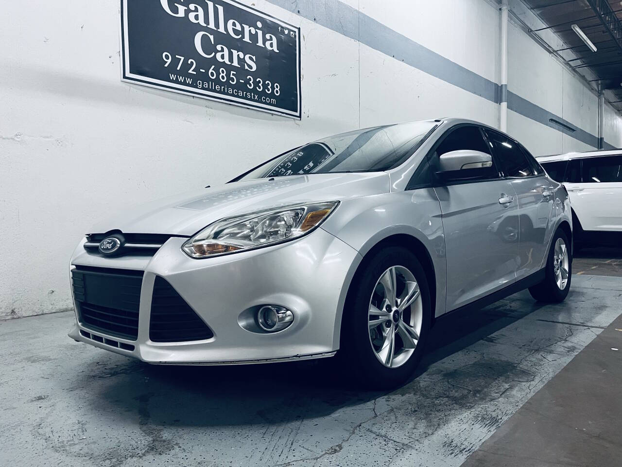Silver 2012 Ford Focus SE SE 4dr Sedan 2