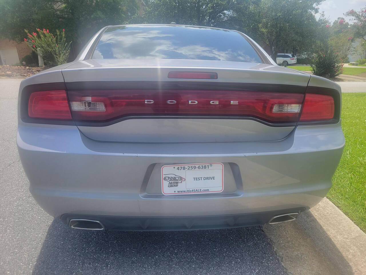 2014 Dodge Charger for sale at Connected Auto Group in Macon, GA