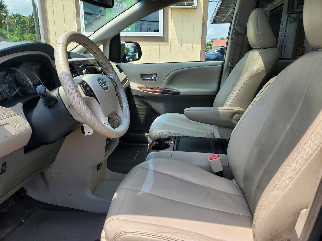 2013 Toyota Sienna for sale at DAGO'S AUTO SALES LLC in Dalton, GA