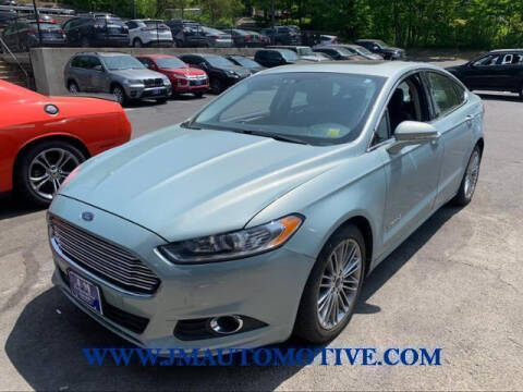 2013 Ford Fusion Hybrid for sale at J & M Automotive in Naugatuck CT
