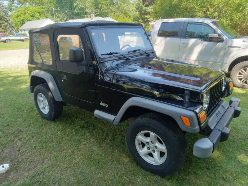 2003 Jeep Wrangler for sale at Heartbeat Used Cars & Trucks in Harrison Township MI