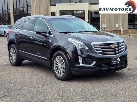 2018 Cadillac XT5 for sale at RAVMOTORS - CRYSTAL in Crystal MN