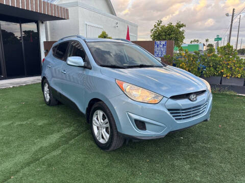 2011 Hyundai Tucson for sale at UNITED AUTO BROKERS in Hollywood FL