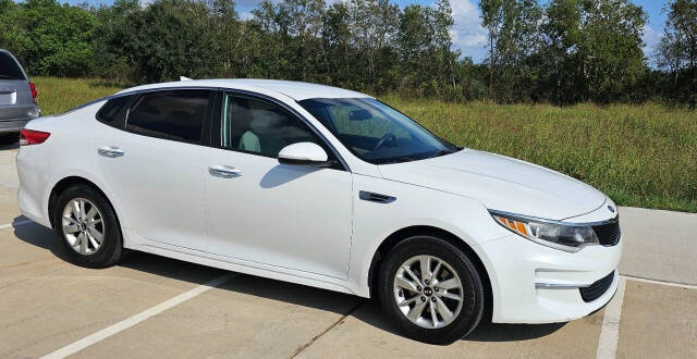 2018 Kia Optima for sale at CAR MARKET AUTO GROUP in Sugar Land, TX