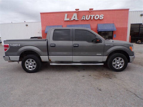 2012 Ford F-150 for sale at L A AUTOS in Omaha NE