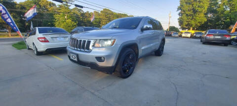 2011 Jeep Grand Cherokee for sale at DADA AUTO INC in Monroe NC