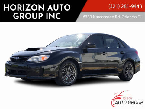 2013 Subaru Impreza for sale at HORIZON AUTO GROUP INC in Orlando FL