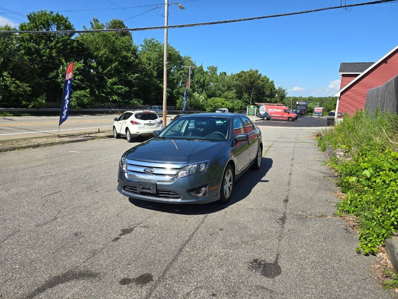 2012 Ford Fusion for sale at PAKLAND AUTO SALES in Auburn, MA