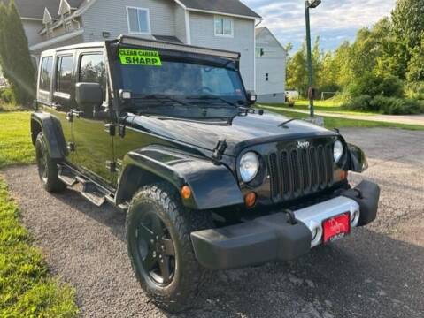 2010 Jeep Wrangler Unlimited for sale at FUSION AUTO SALES in Spencerport NY