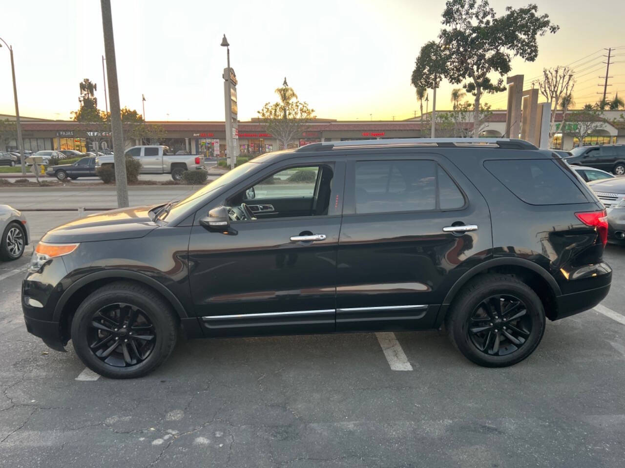 2015 Ford Explorer for sale at Unique Auto Sales, Inc. in Bell, CA