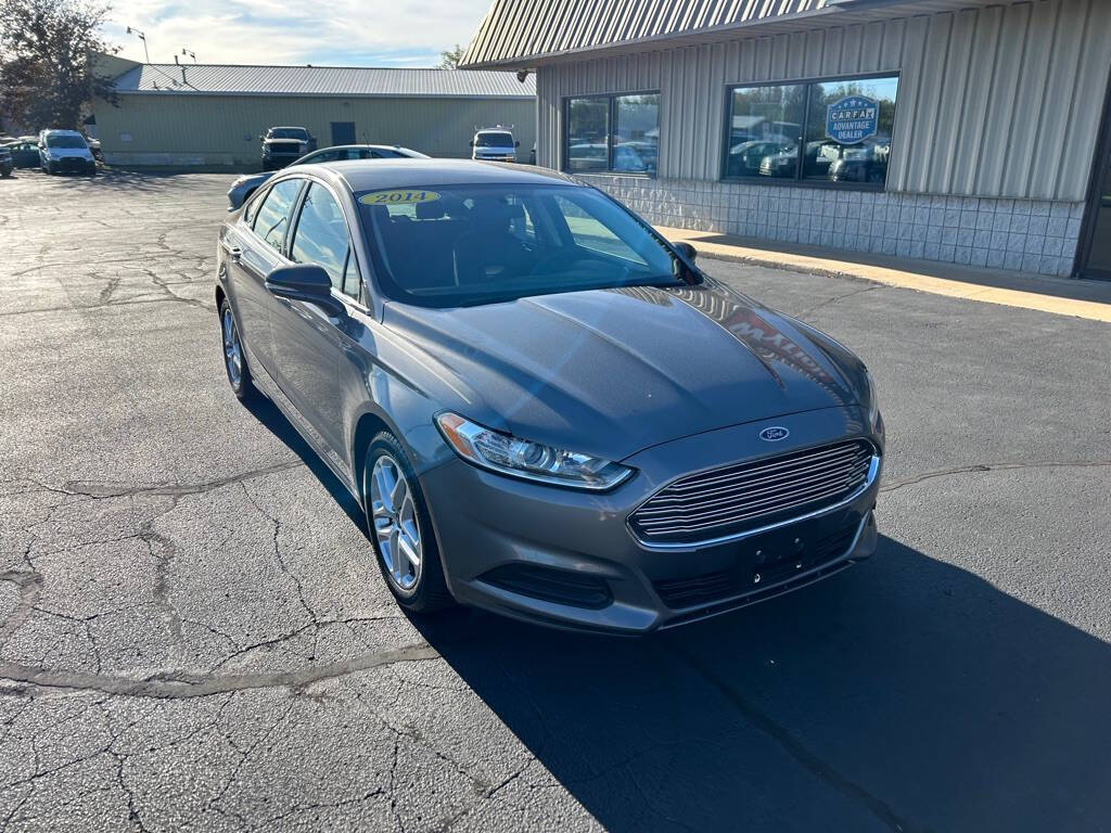 2014 Ford Fusion for sale at Wyrick Auto Sales & Leasing Inc in Zeeland, MI