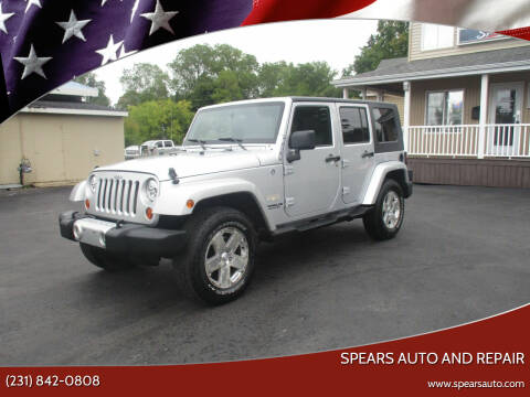 2009 Jeep Wrangler Unlimited for sale at Spears Auto and Repair in Cadillac MI