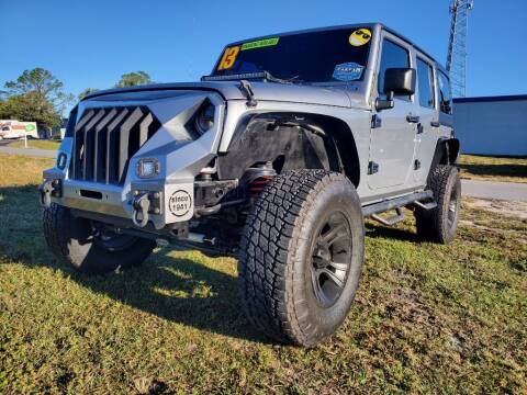 2013 Jeep Wrangler Unlimited for sale at Mox Motors in Port Charlotte FL
