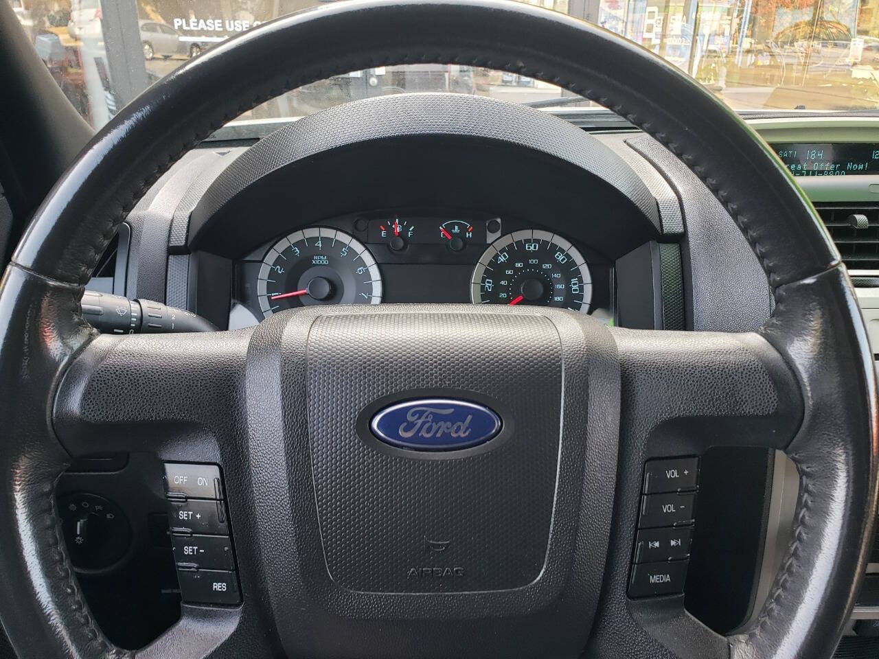 2011 Ford Escape for sale at Auto Shop in Wyoming, MI