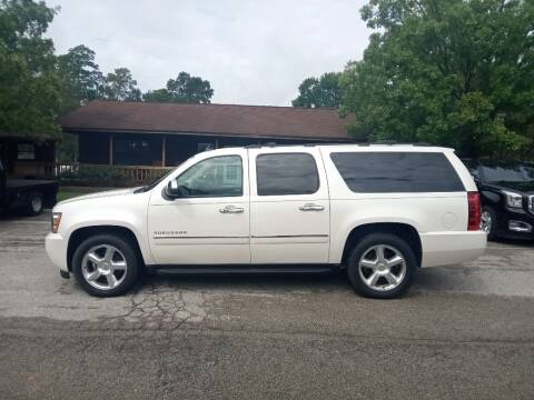2013 Chevrolet Suburban for sale at Victory Motor Company in Conroe TX