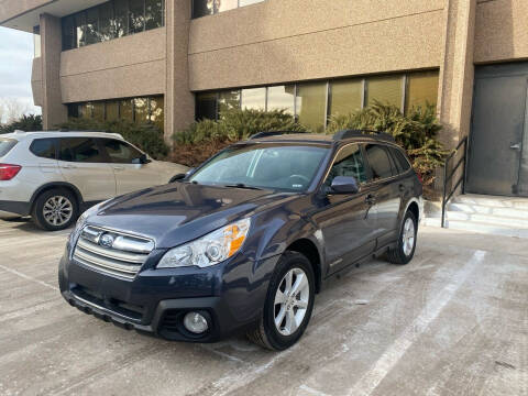 2014 Subaru Outback for sale at QUEST MOTORS in Englewood CO