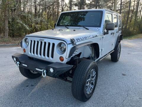 2011 Jeep Wrangler Unlimited for sale at Luxury Cars of Atlanta in Snellville GA
