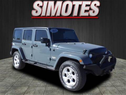 2015 Jeep Wrangler Unlimited for sale at SIMOTES MOTORS in Minooka IL